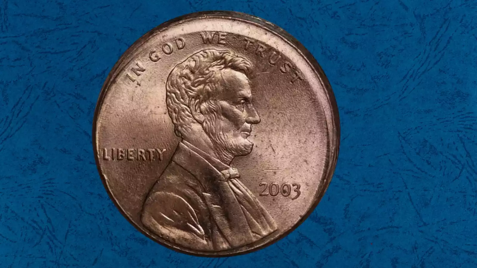 2003 Lincoln penny off-center strike showing blank crescent area with design shifted dramatically to one side