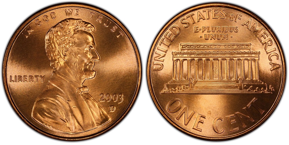 2003 Lincoln penny partial collar strike showing stepped railroad rim on one edge where coin was partially outside the collar